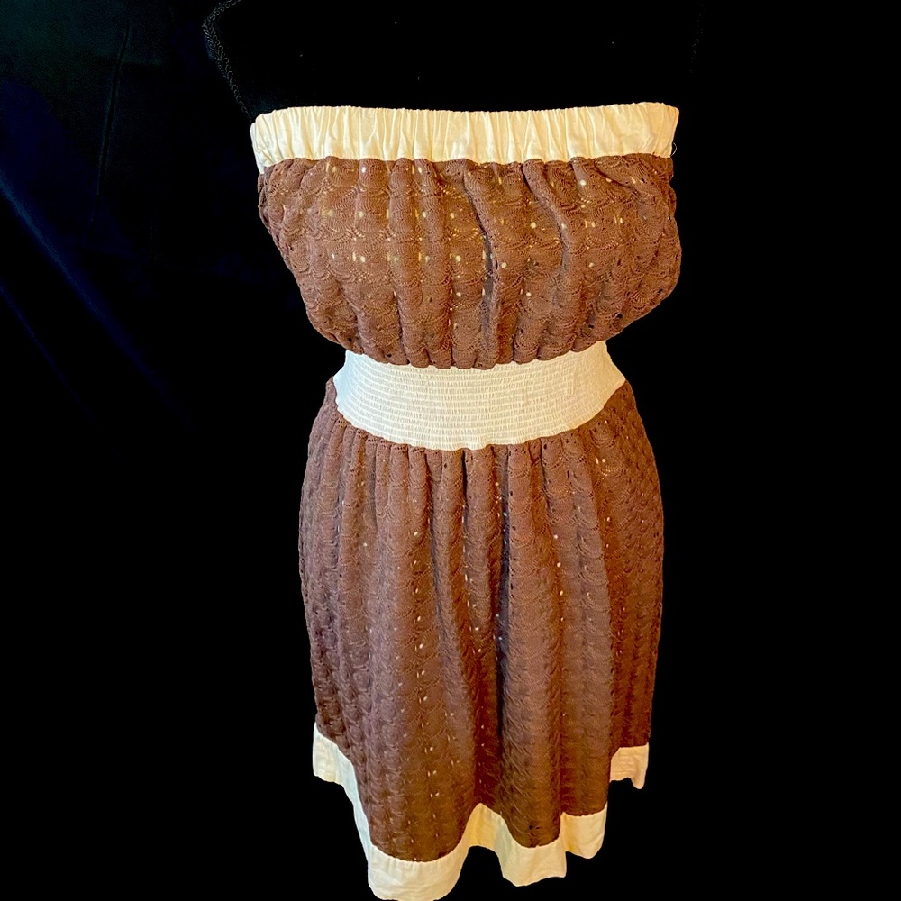 Brown and white strapless dress.